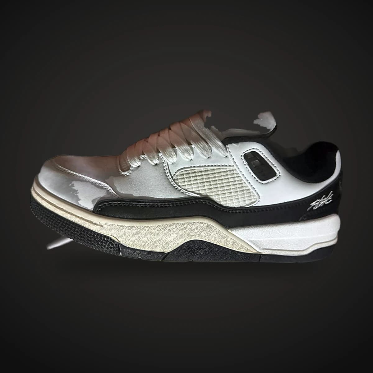 Sneaker urbano blanco y negro