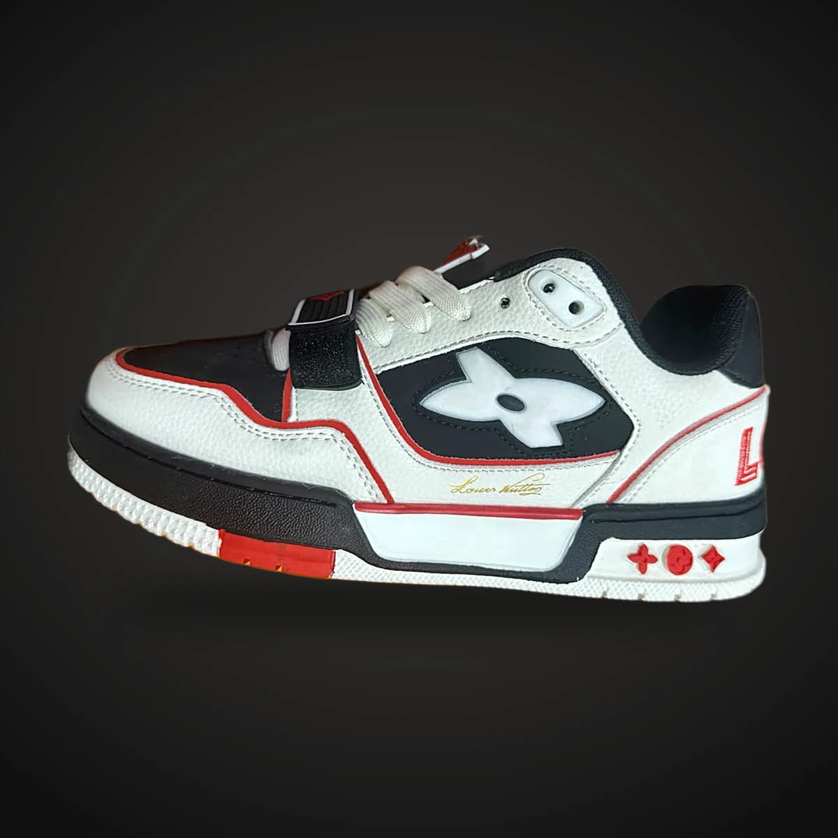 Trainer bajo blanco, negro y rojo